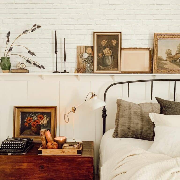 White Brick Wall Bedroom with a Picture Shelf
