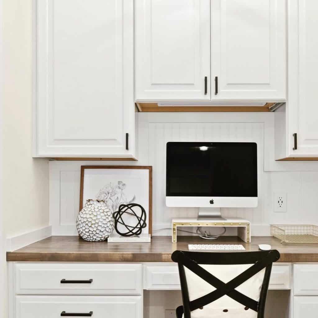 White Built-in Desk in a Kitchen