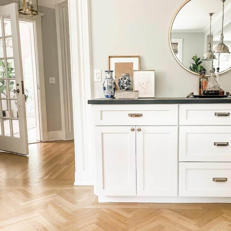 White Cabinet with Bottles and Jars