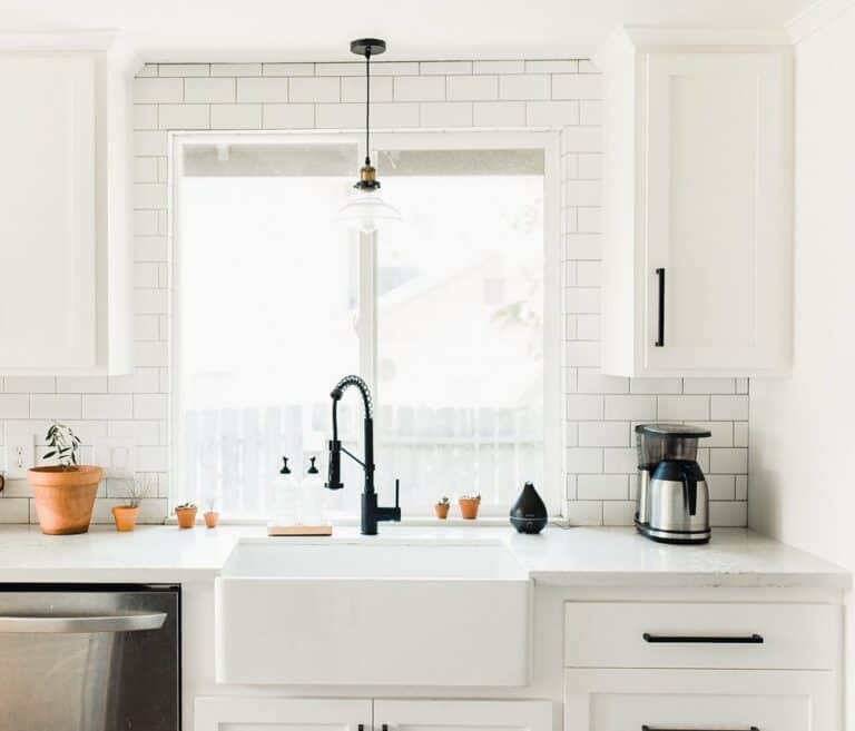 White Cabinets on a White Subway Tile Wall