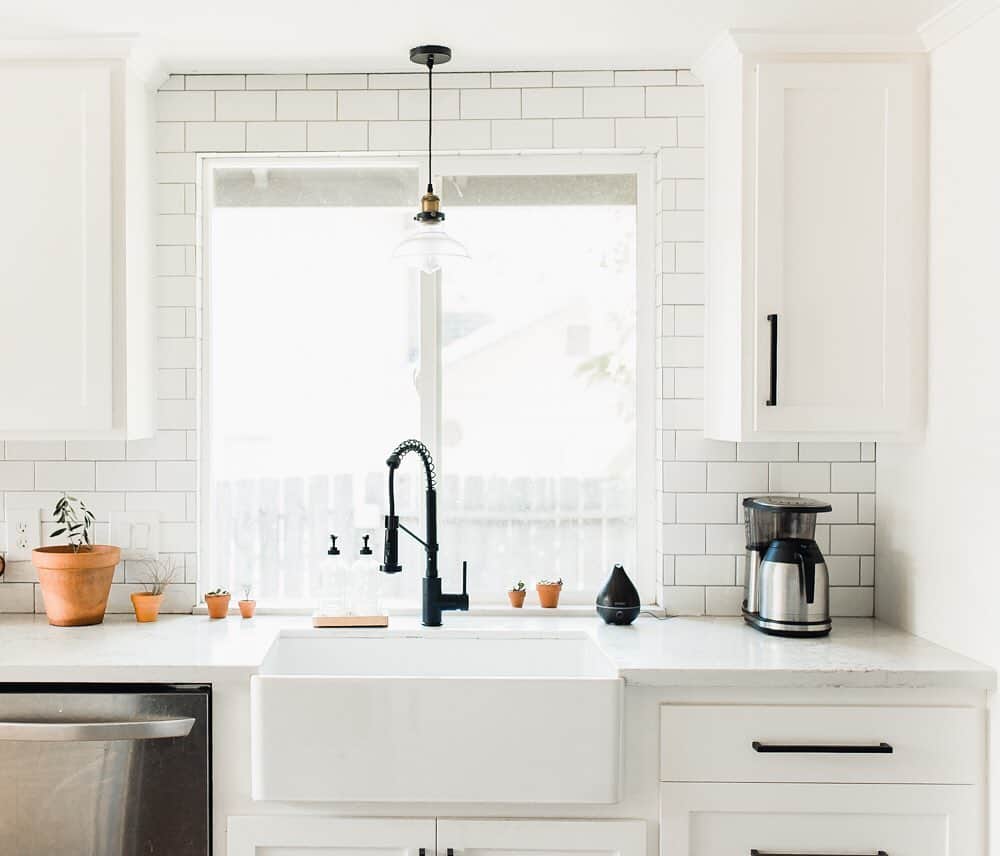 White Cabinets on a White Subway Tile Wall