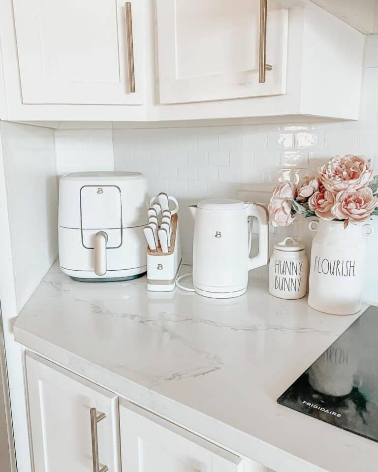 White Counter Against White Backsplash