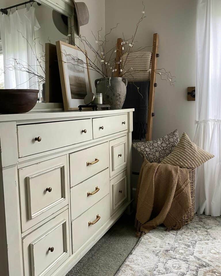 White Dresser with Brass Drawer Pulls and Knobs