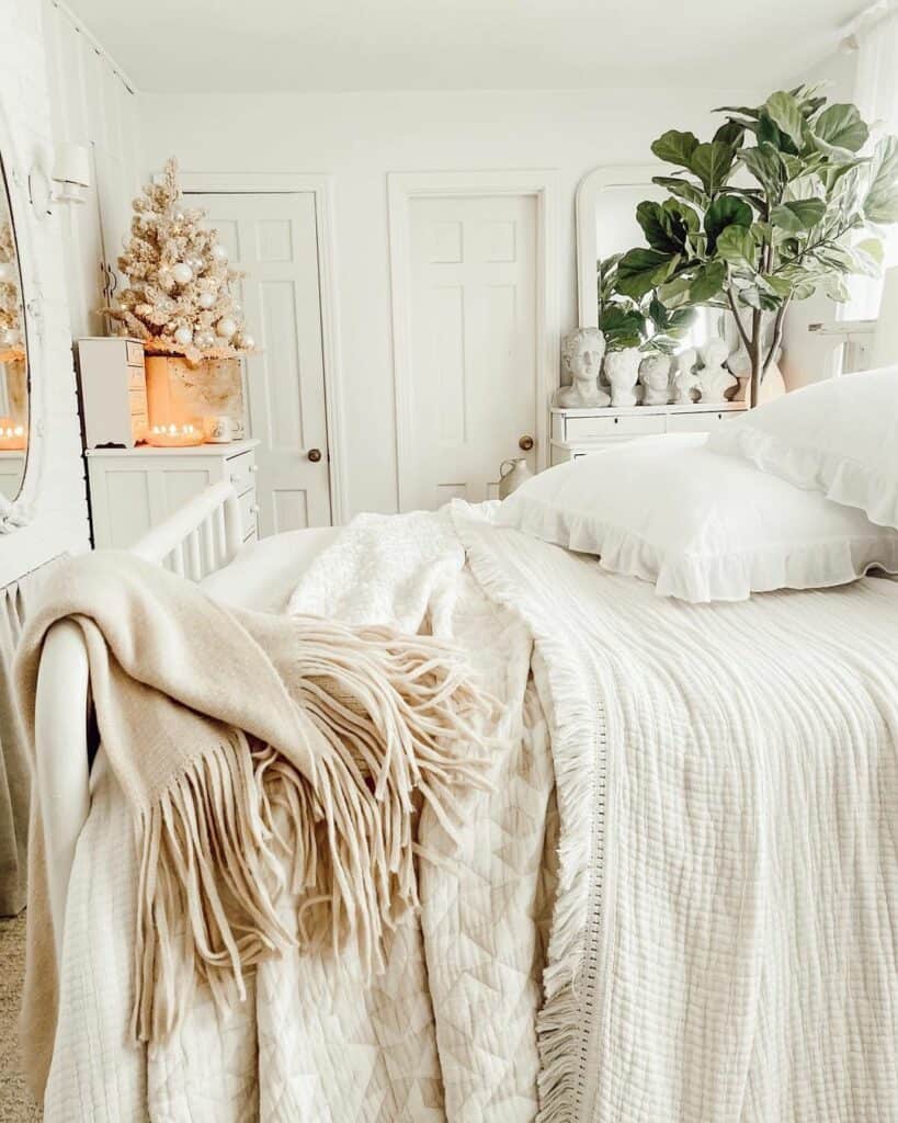 White Farmhouse Bedroom With Potted Plant