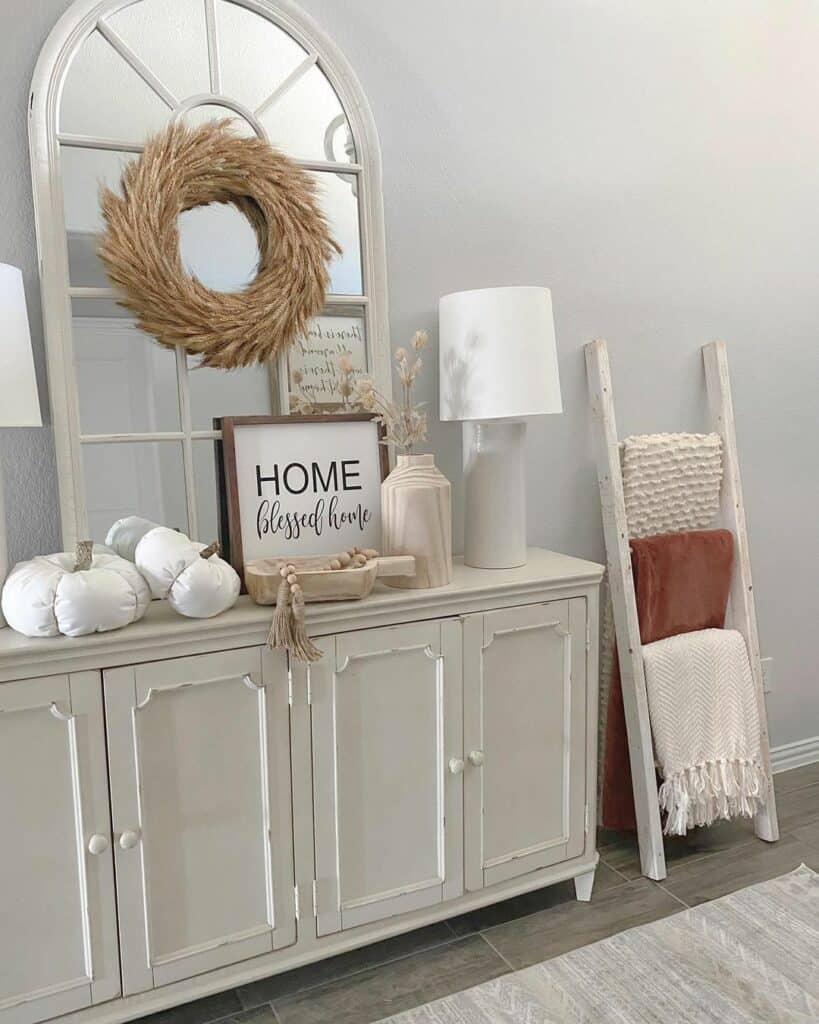 White Farmhouse Entryway with Blanket Ladder