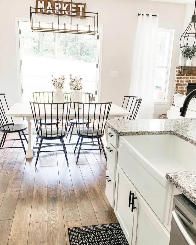 White Farmhouse Table With Black Spindle Kitchen Chairs