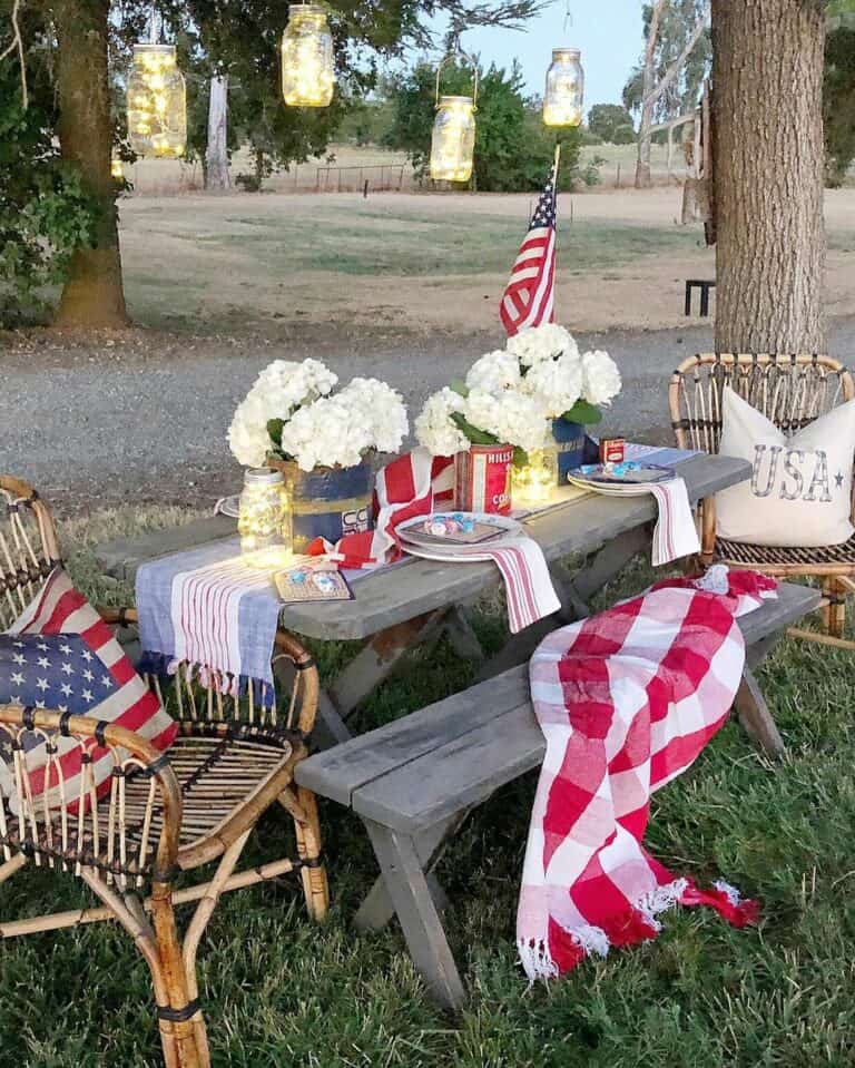 White Flower on Outdoor Picnic Table