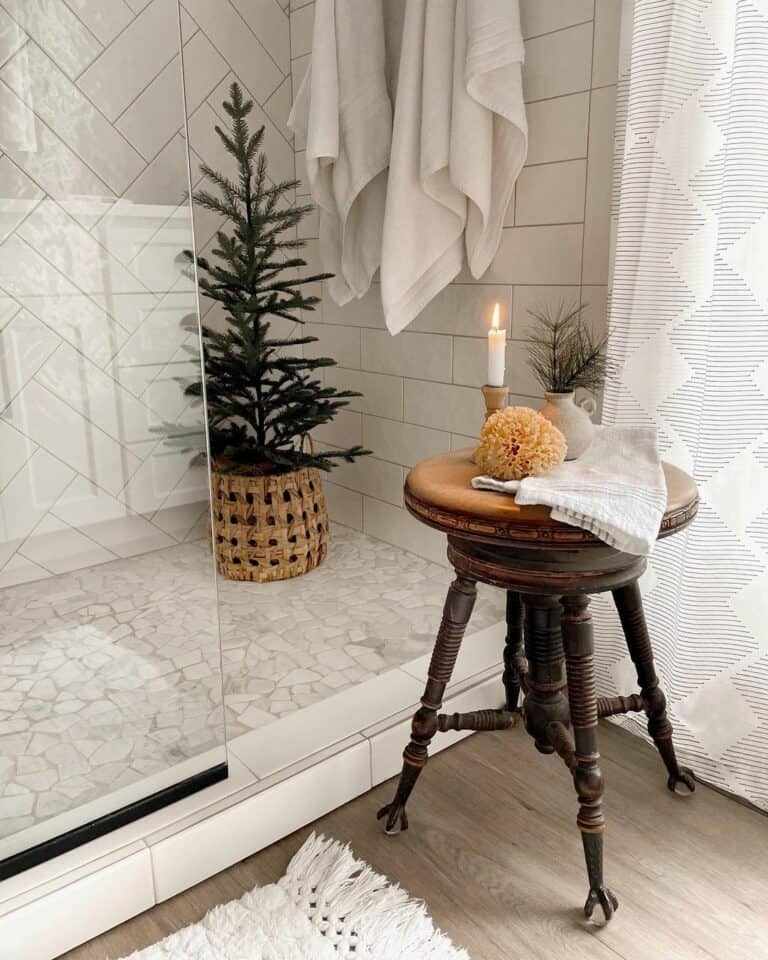 White Herringbone Paired With a White Subway Tile Wall
