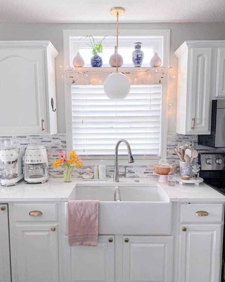 White Kitchen With Apron Sink and Gold Hardware