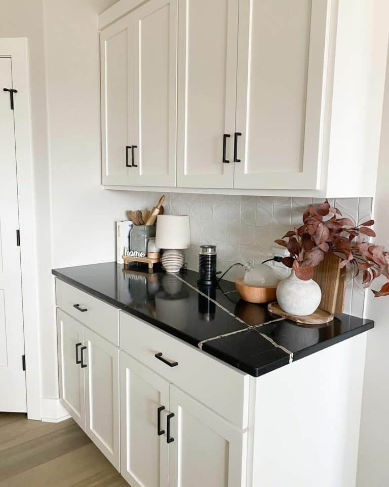 White Kitchen With Black Veined Countertop