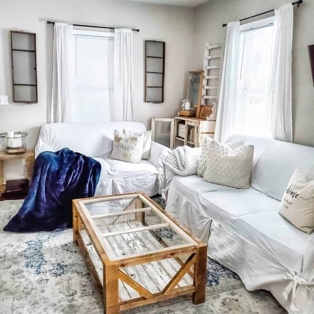 White Living Room Couch with Accents of Blue