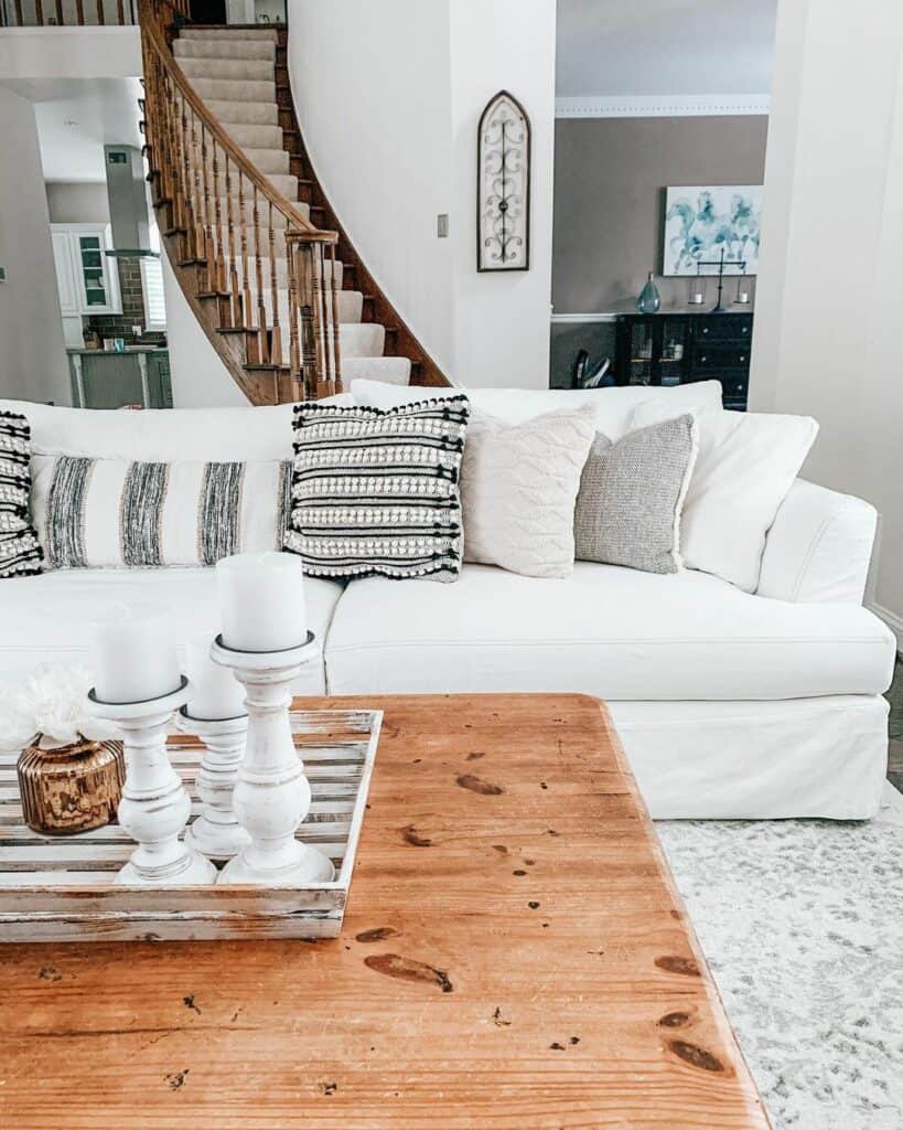 White Living Room Couch with Wooden Coffee Table