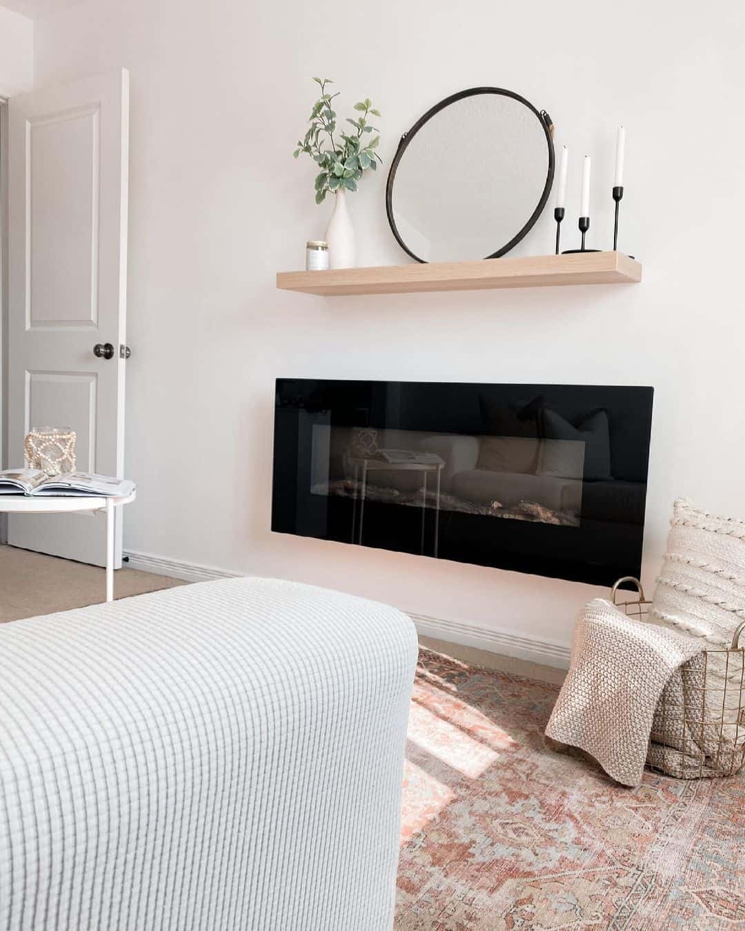 White Living Room With Black Electric Fireplace - Soul & Lane