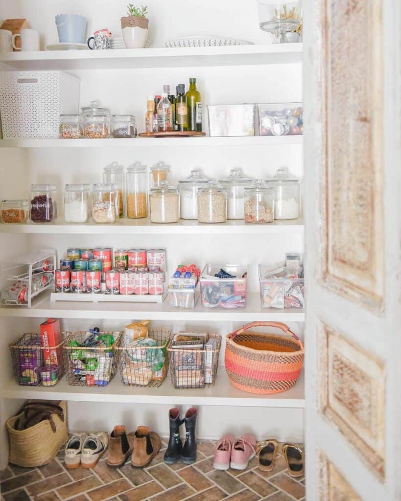 White Pantry Shelves with Glass Canisters