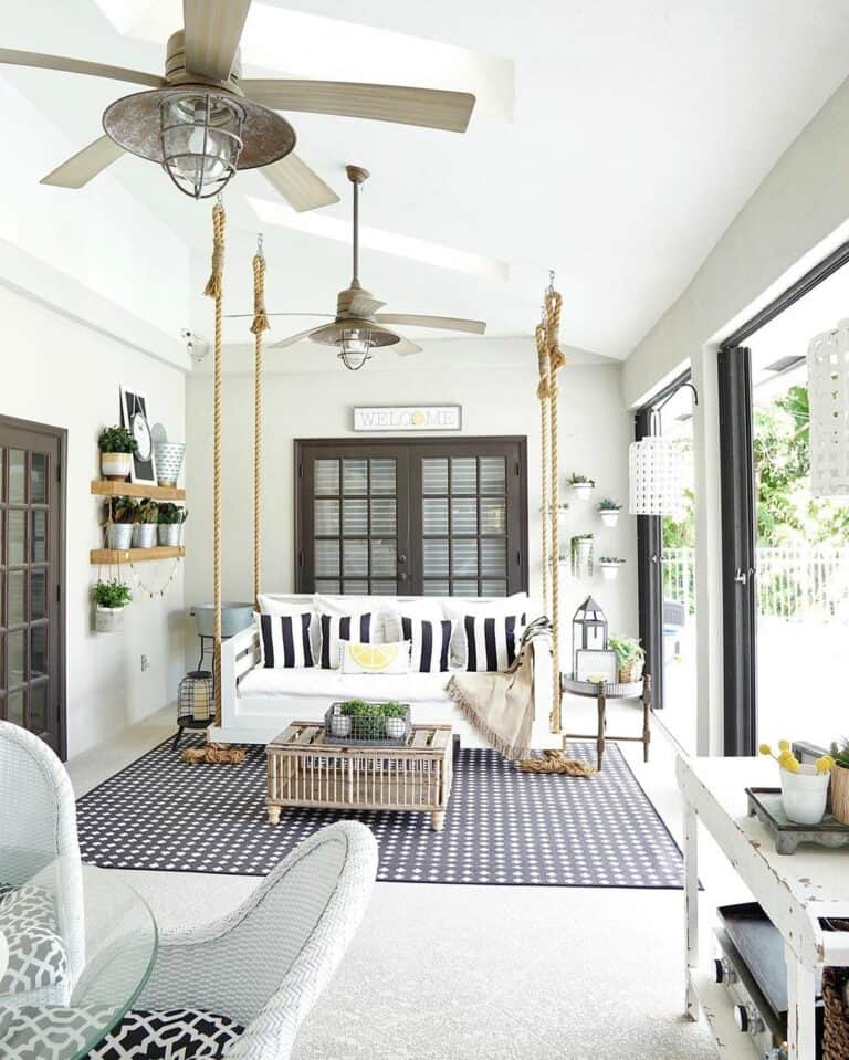 White Porch Swing on Farmhouse Porch