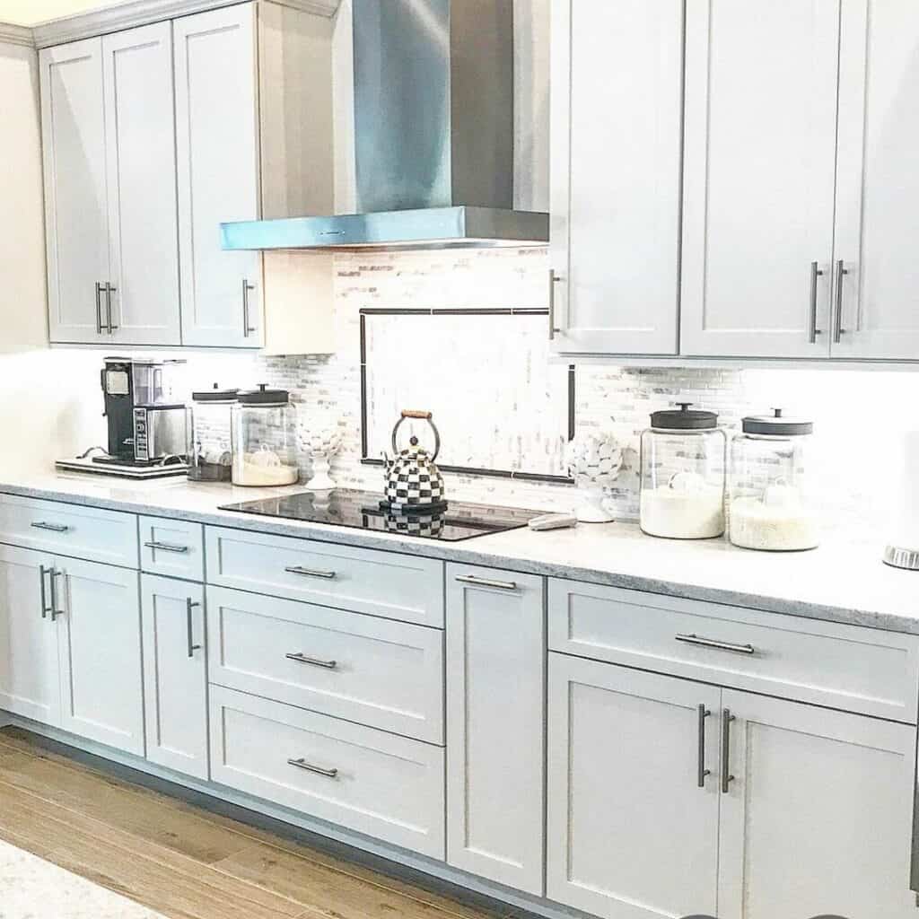 White Shaker Cabinets with Nickel Pulls