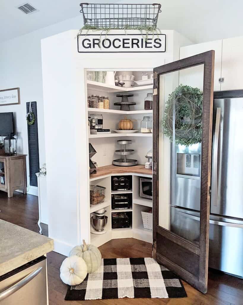 White Shelves and Wooden Pantry Countertop