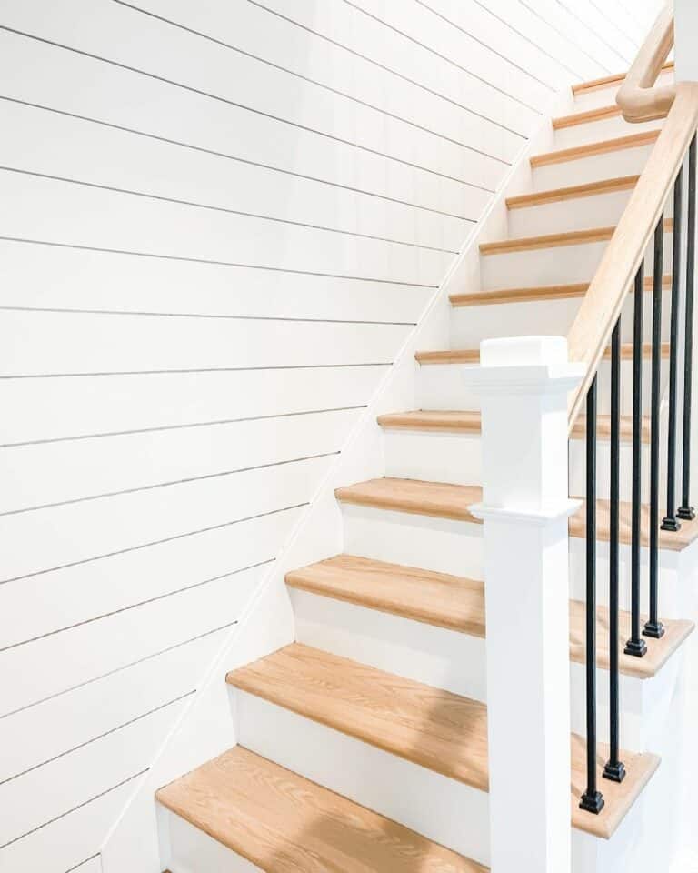 White Shiplap Stairwell with Light Wood Treads