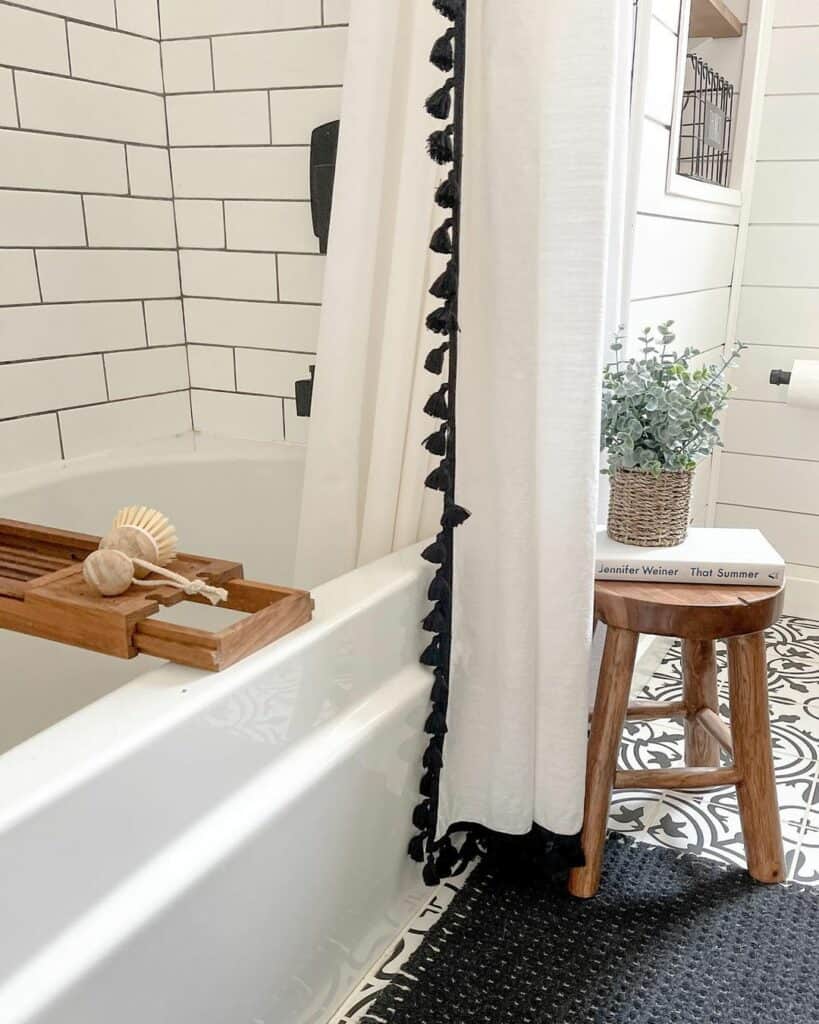 White Shower and Tub Combo With Wood Bathroom Stool