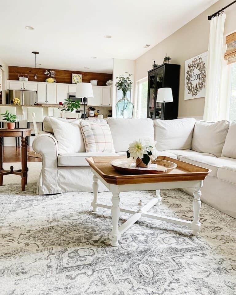 White Sofa with White and Wood Coffee Table