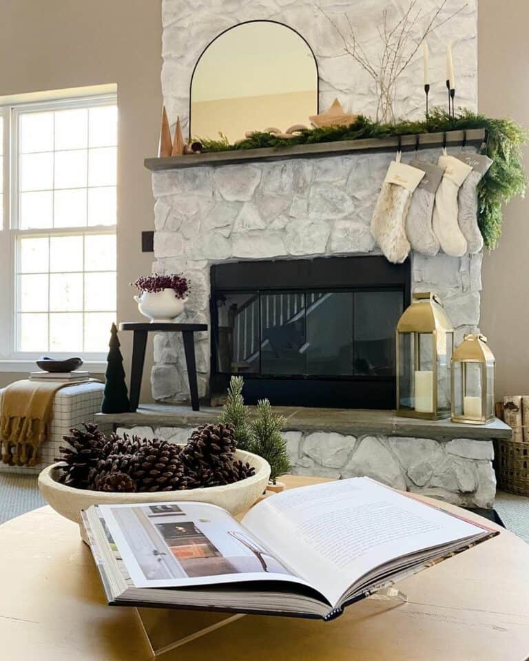 White Stone Fireplace with Christmas Mantel Garland