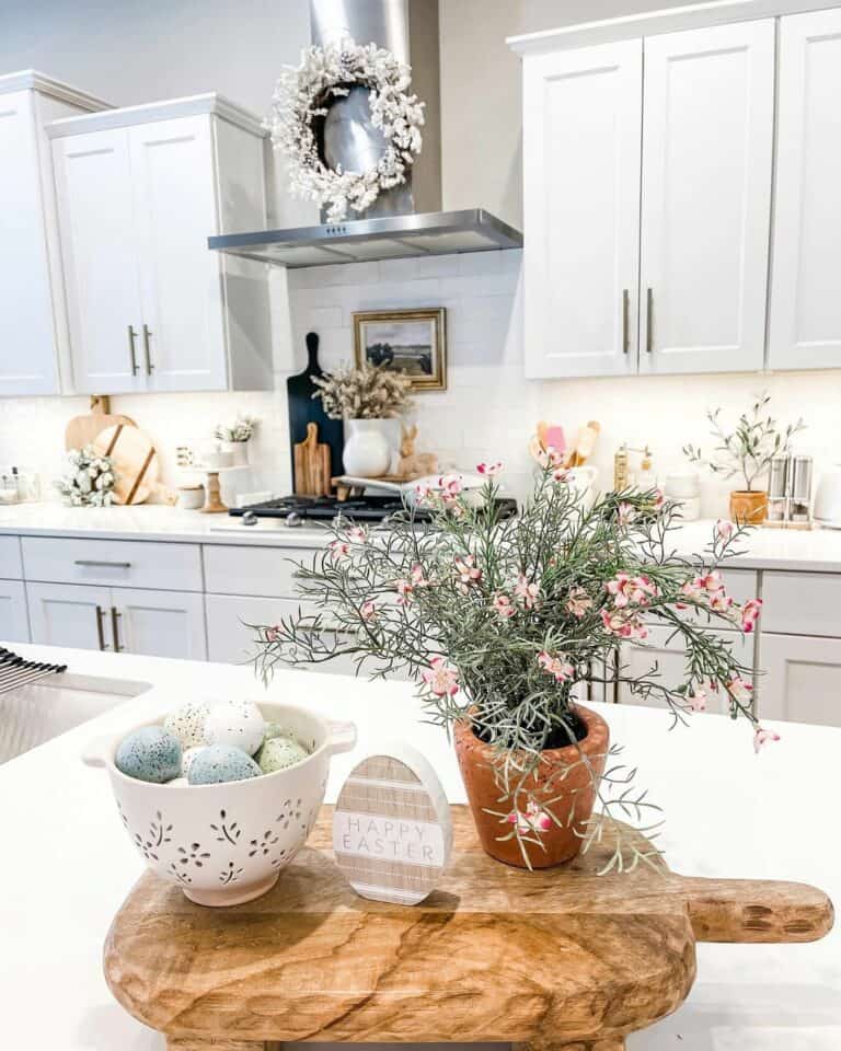 White Subway Tile Backsplash and a White Wreath