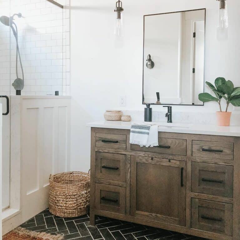 White Subway Tile Shower and a Black Herringbone Floor