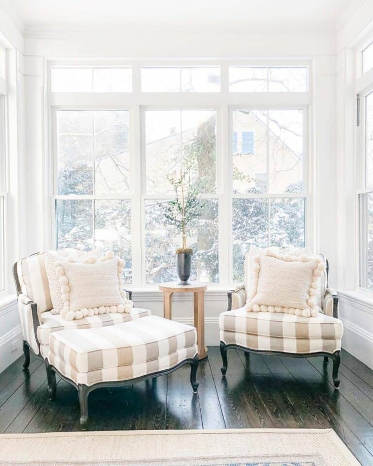 White Sunroom with Natural Wood Furniture