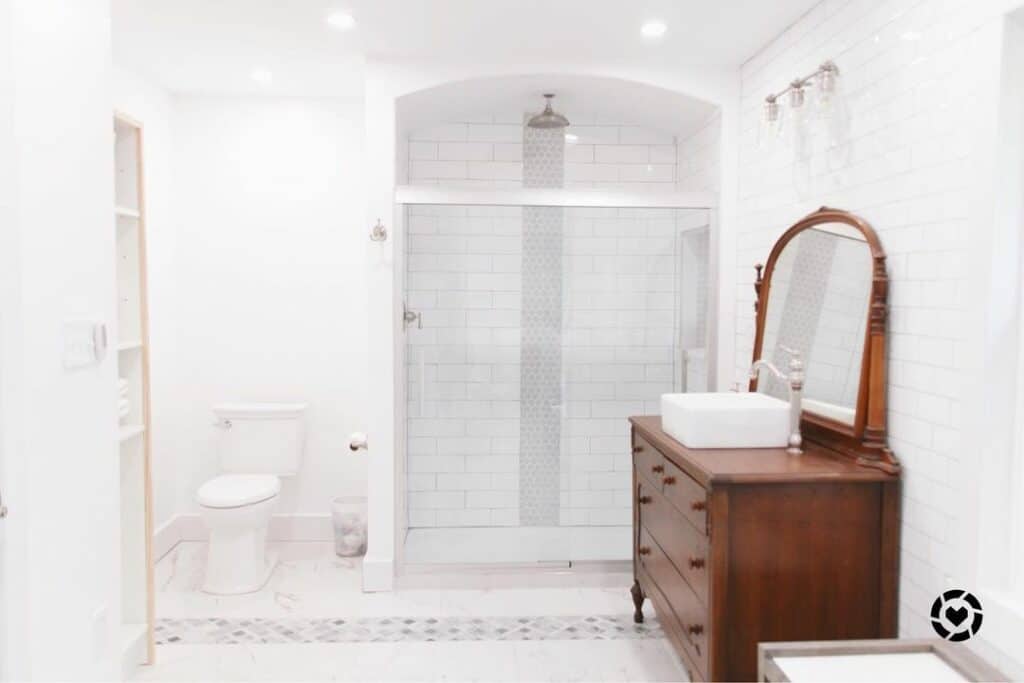 White Tile Bathroom with Vintage Vanity