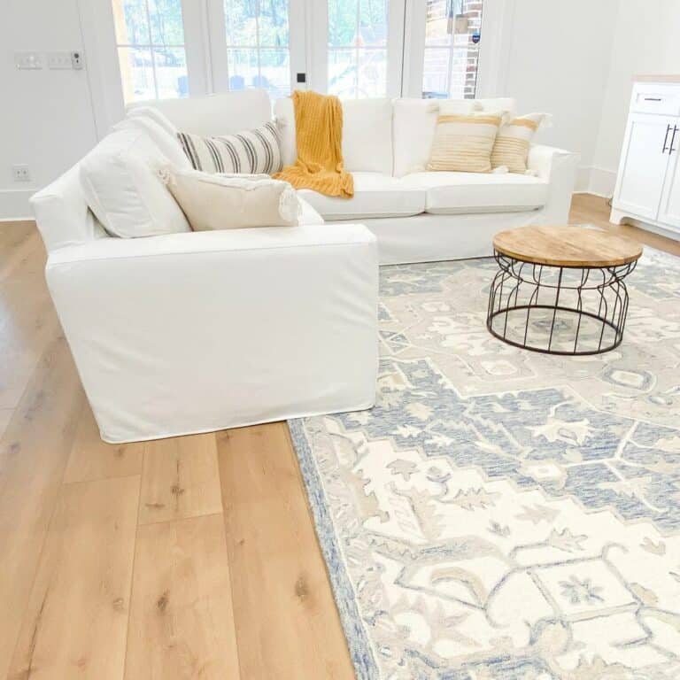 White and Blue Accents Highlight Wood Flooring