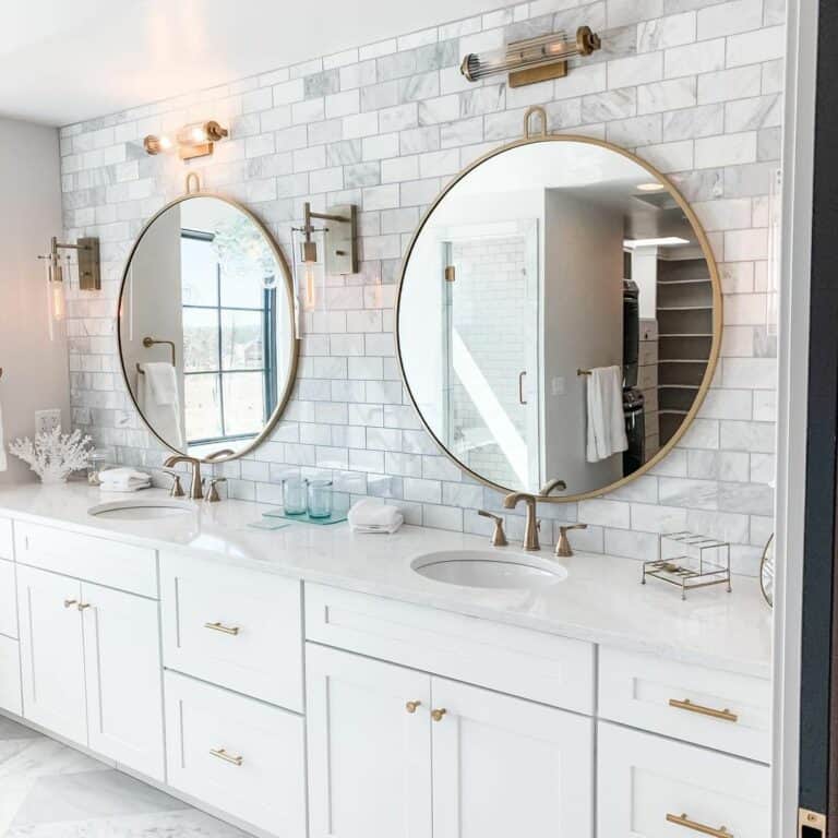 White and Brass Bathroom With Accent Wall