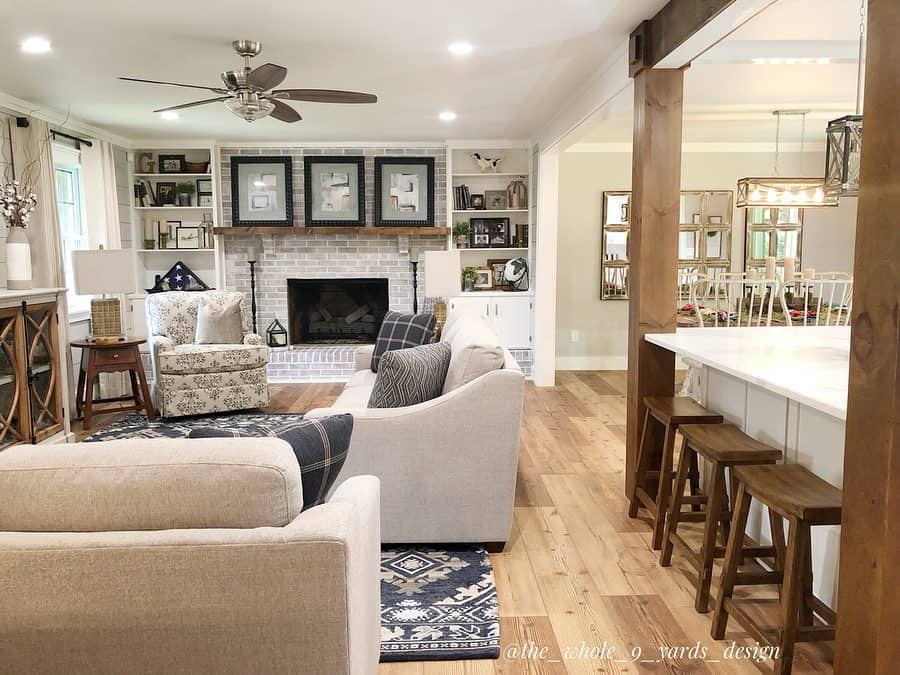 Wood Columns Separate Kitchen From Living Room