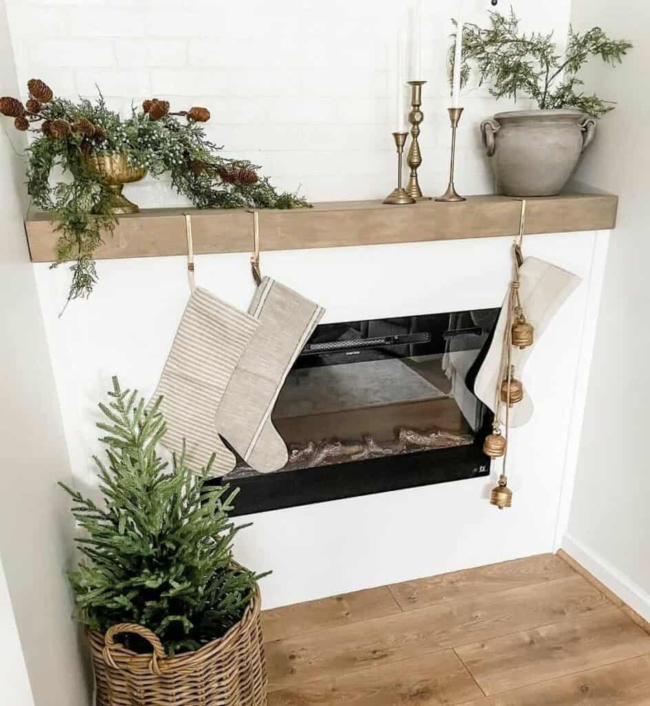 Wood Flooring and Brass Mantel Décor