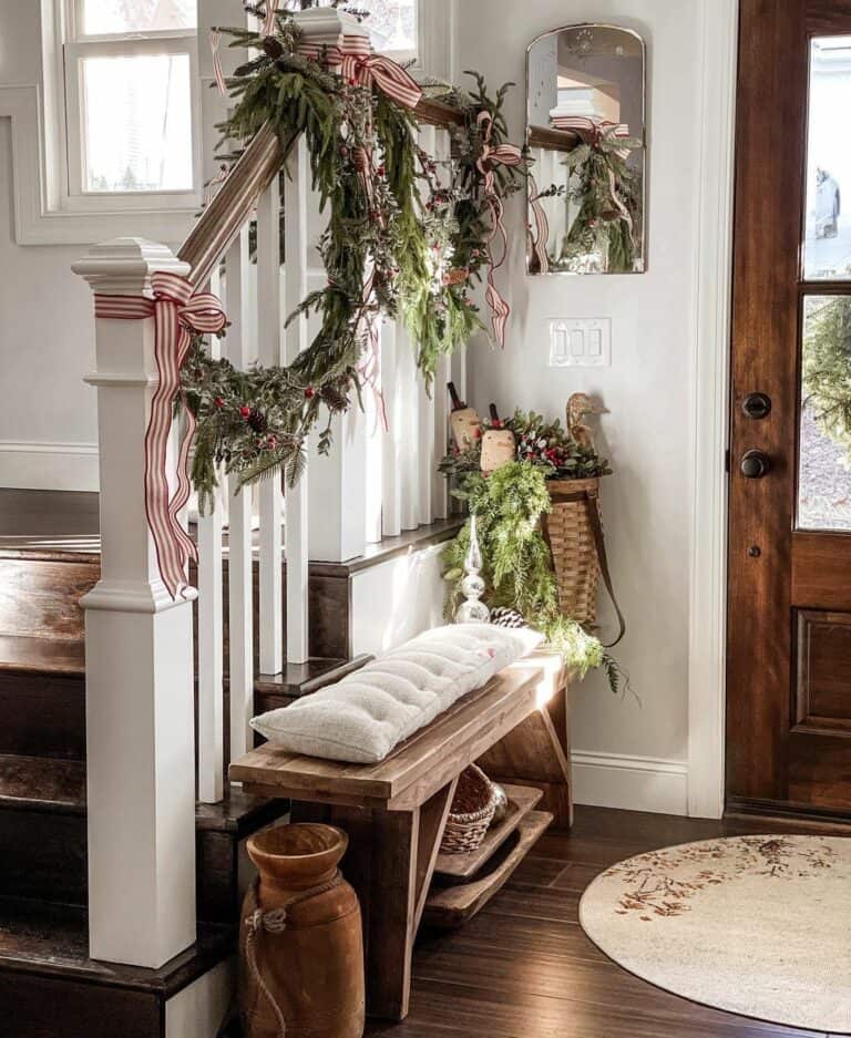 Wooden Bench Sits Below Christmas Décor
