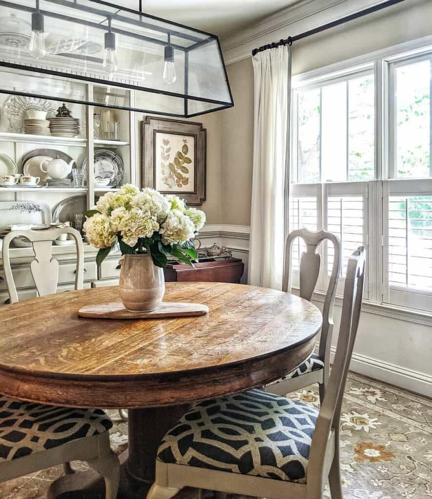 Wooden Dining Table With Farmhouse Floral Centerpiece