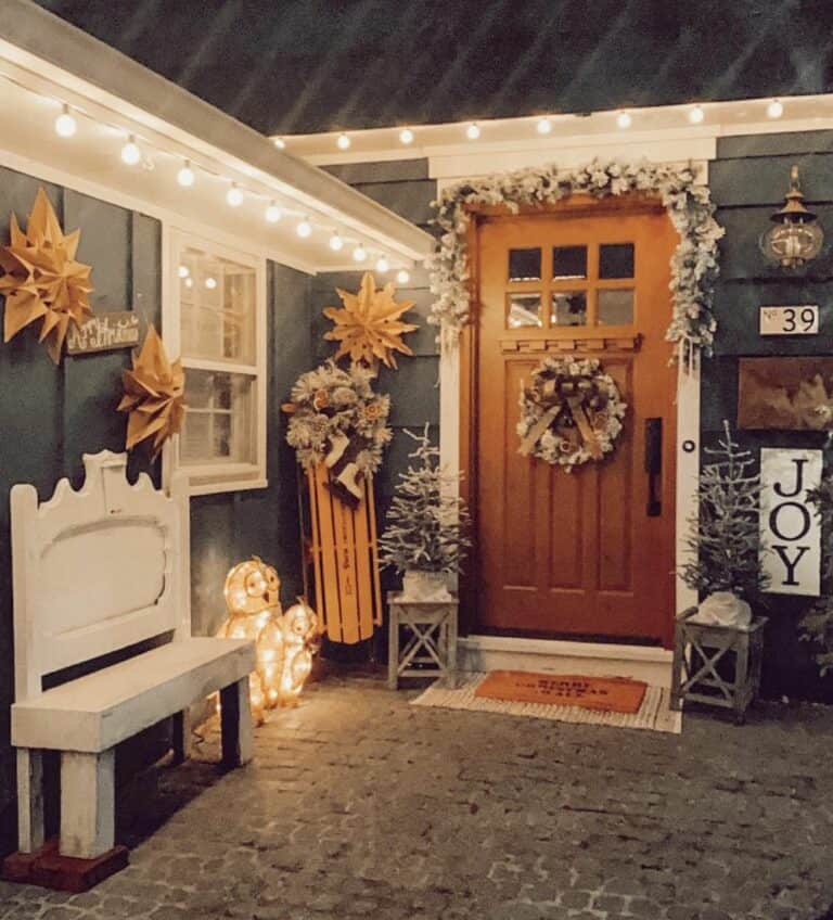 Yellow Front Door With Frosted Christmas Wreath