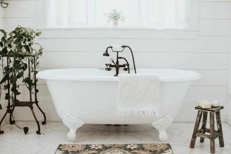 Antique-inspired Bathroom With White Marble Tile