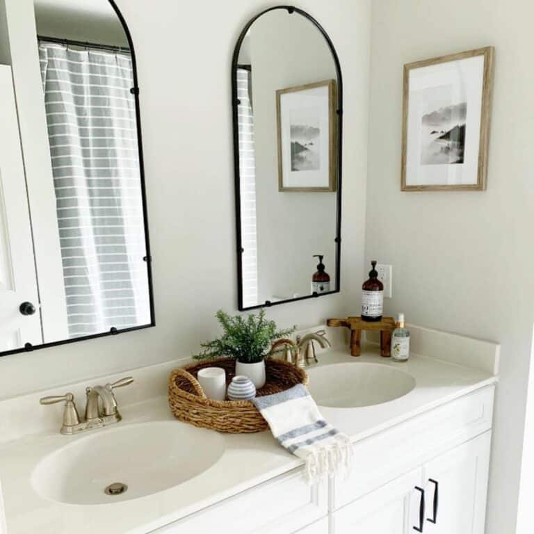 Arched Mirrors Over White Vanity