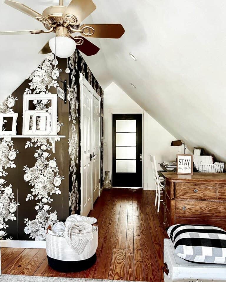 Attic Bedroom With Black and White Floral Wallpaper
