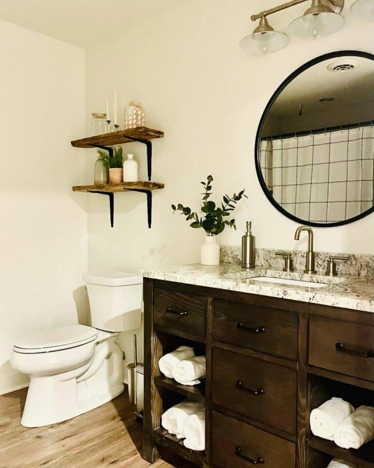 Basement Half Bathroom With Gray and White Marble Sink