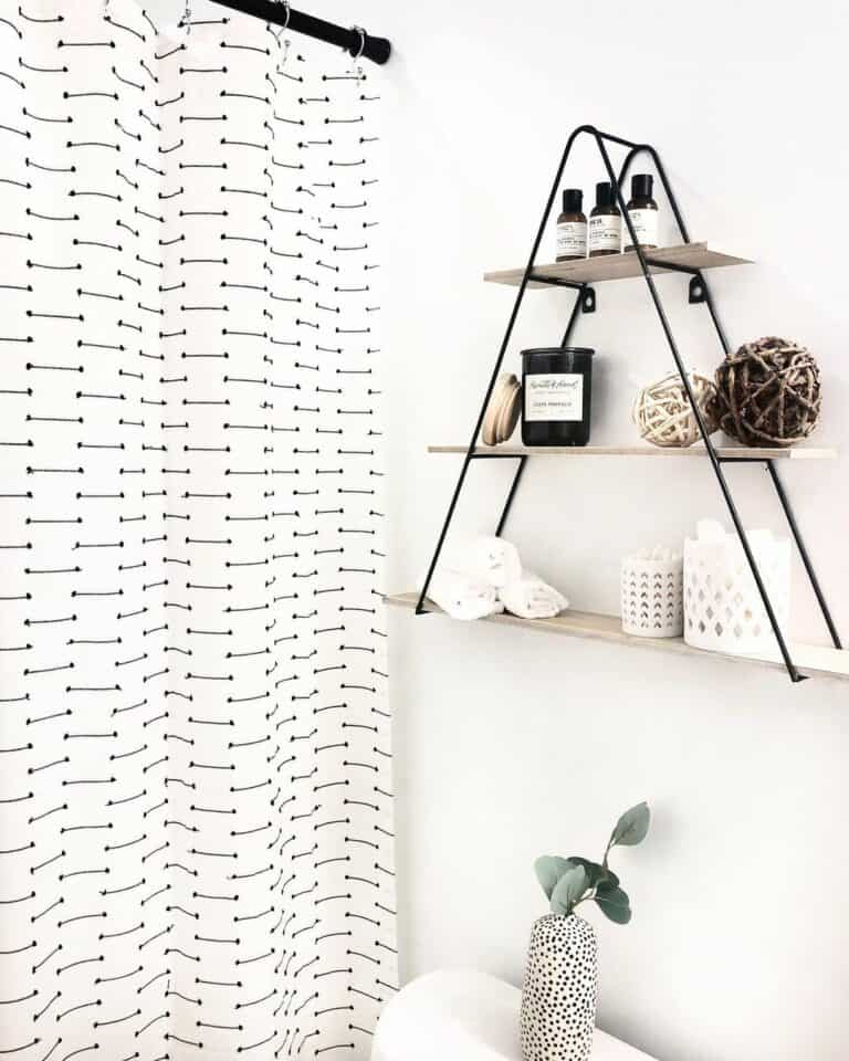 Bathroom Corner With Black Triangle Shelves