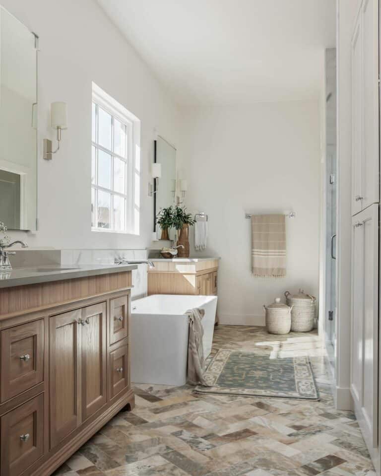 Bathroom With Bathtub Between Counters