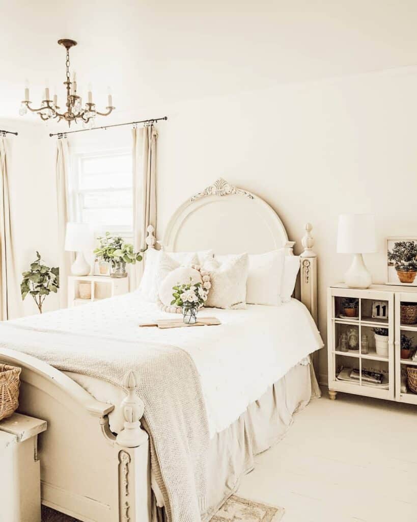 Bedroom With Gold Candelabra and Delicate Pink Flowers