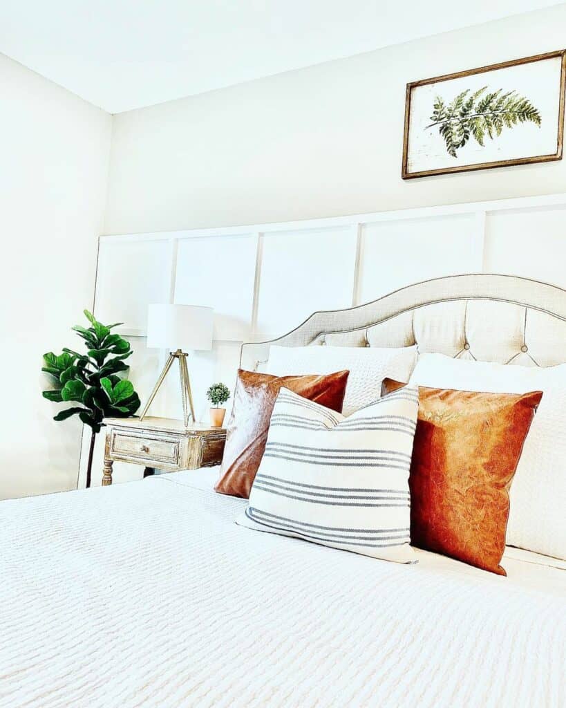 Beige and White Bedroom With Wainscoting