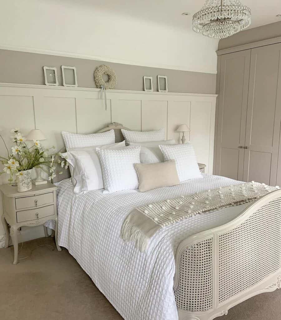 Beige and White Bedroom With Wainscoting