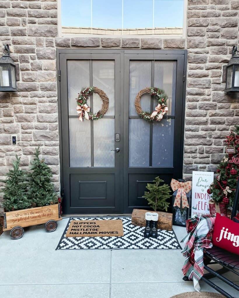Black Double Doors With Grapevine Wreaths