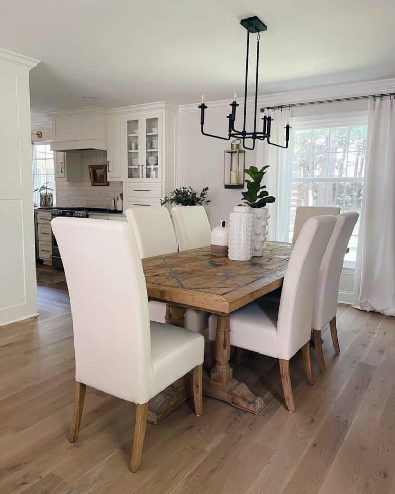 Black Metal Light Over Wood Dining Table