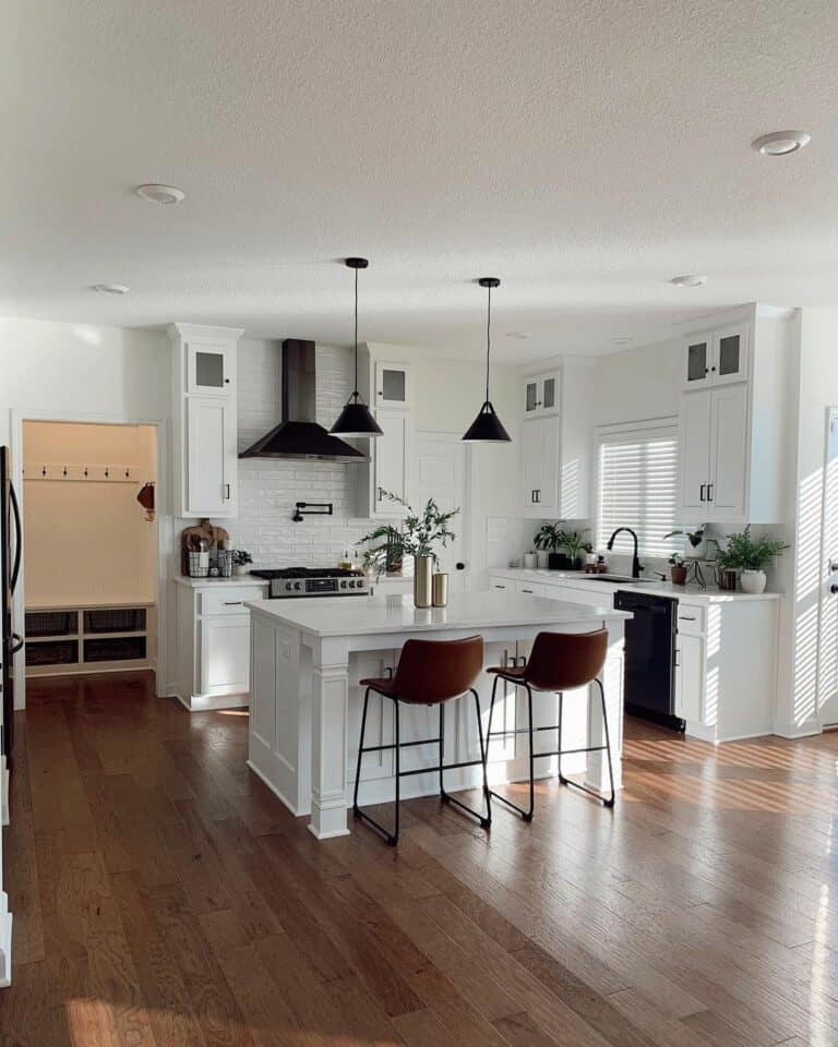 Black Pendant Lights and White Cabinets