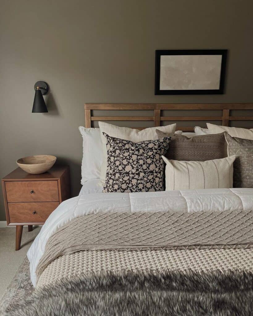 Black Sconce on a Gray Bedroom Wall