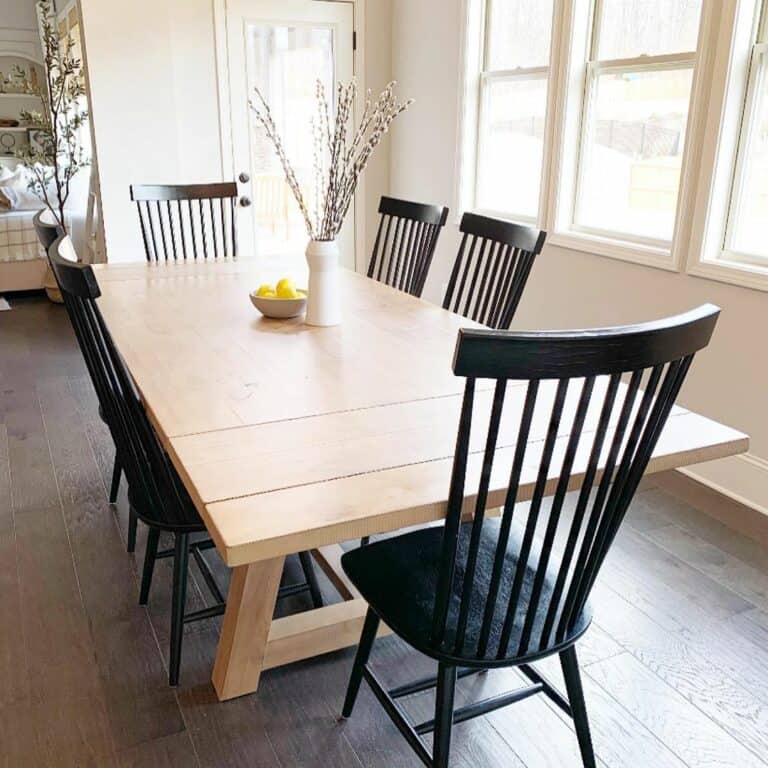 Black Windsor Chairs Surround Dining Table